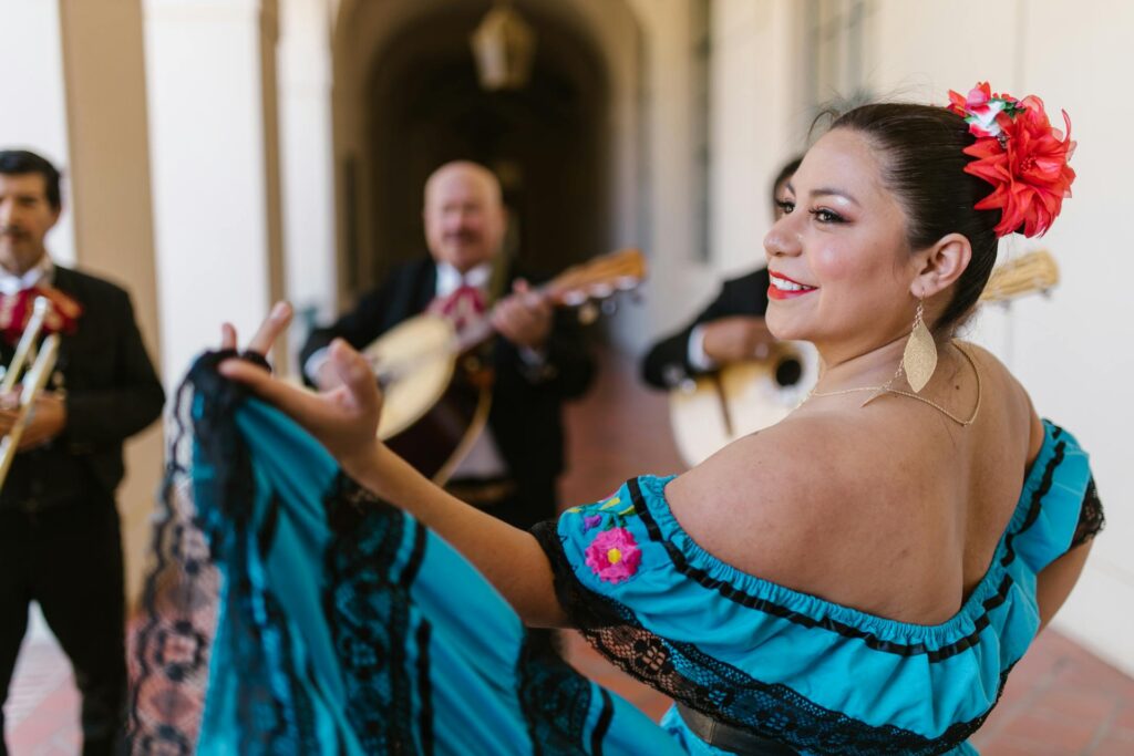 woman dancing in a blue dress