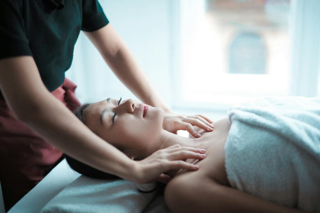 Woman getting a massage in a spa.